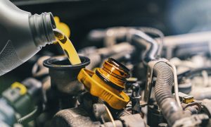 Pouring Oil into Car Engine | Bowie, MD