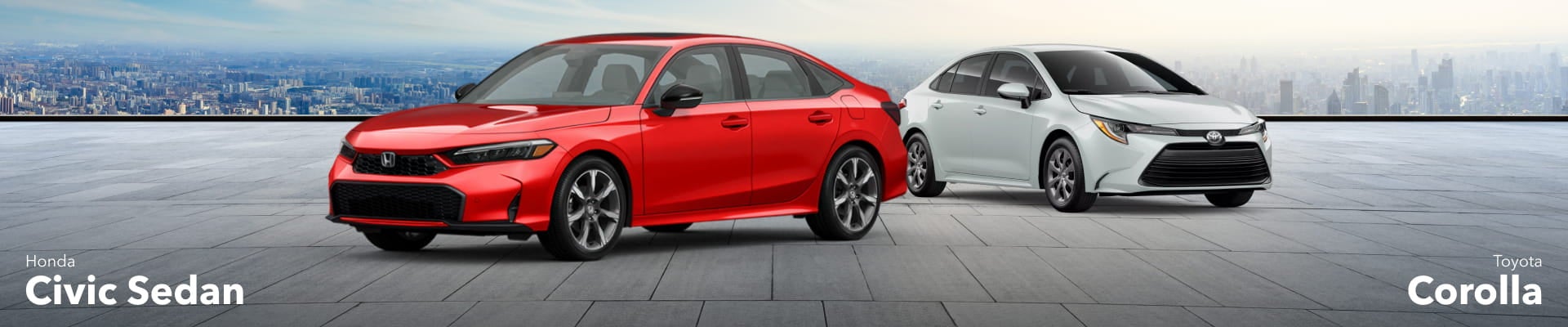 Red Honda Civic Sedan and white Toyota Corolla parked side by side on a rooftop with a city skyline in the background.